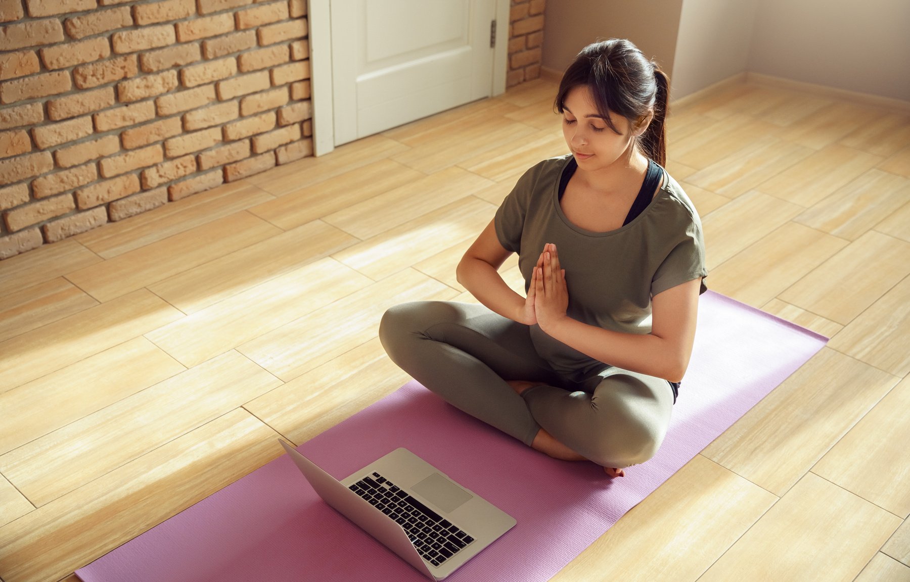 Woman Doing Yoga Exercise Online